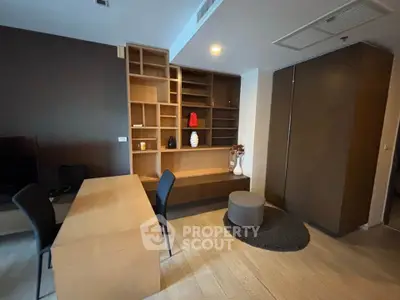 Modern study room with sleek wooden desk and built-in shelving