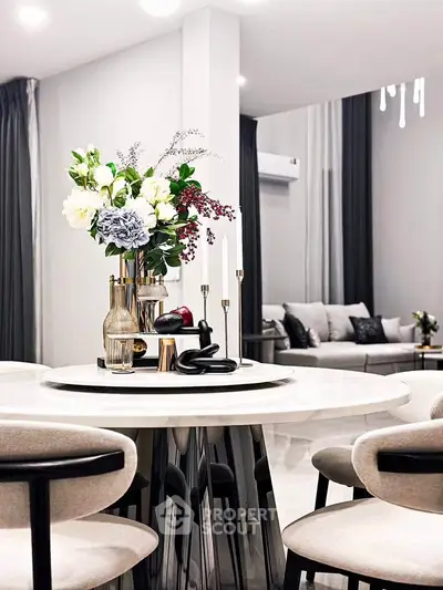 Elegant modern living room with stylish decor and cozy seating area, perfect for relaxation and entertaining.