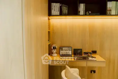 Modern study room with wooden decor and built-in desk, featuring ambient lighting and stylish shelving.