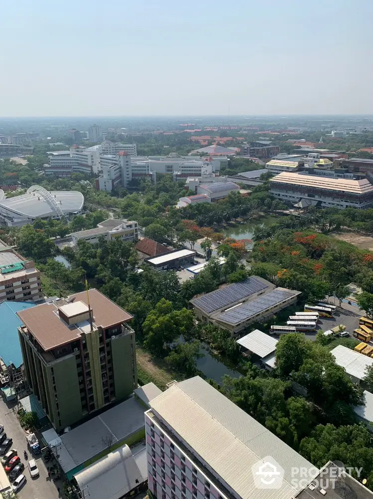 Stunning aerial view of urban landscape with lush greenery and modern buildings