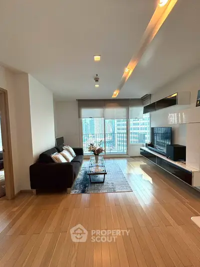 Spacious modern living room with city view and elegant decor