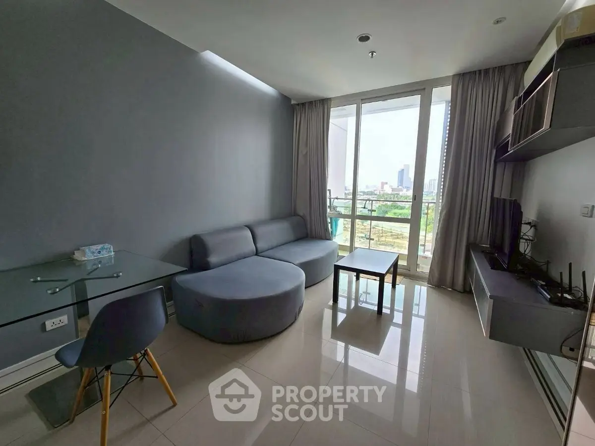 Modern living room with city view and sleek furniture