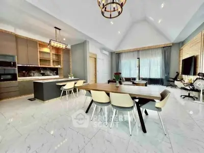 Spacious modern living room with open kitchen and elegant dining area