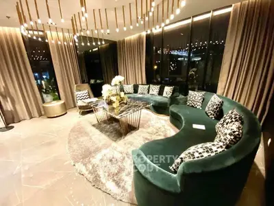 Luxurious living room with elegant curved sofa and modern lighting