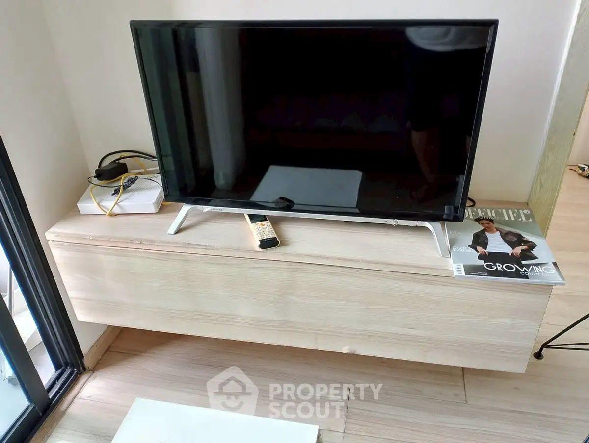 Modern living room with sleek TV stand and contemporary decor