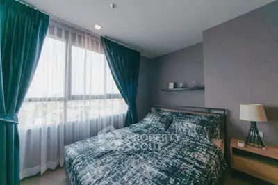 Cozy bedroom with modern decor and large window with curtains