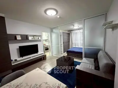 Modern studio apartment with open layout and stylish furnishings