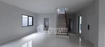 Spacious modern interior with glossy floors and staircase, ideal for customization.