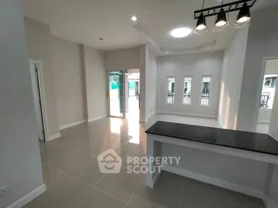 Spacious modern living area with open layout and natural light