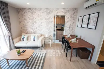 Modern living room with stylish decor and open kitchen layout