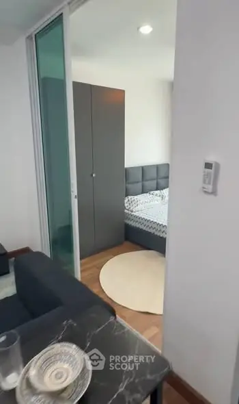 Modern apartment interior with cozy bedroom and stylish living area