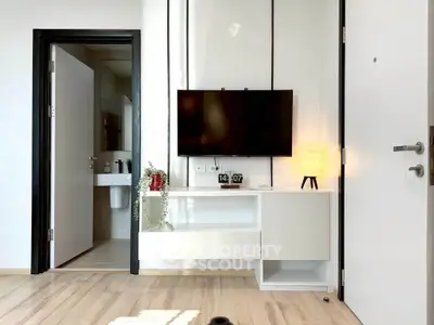 Modern living room with sleek TV setup and stylish decor
