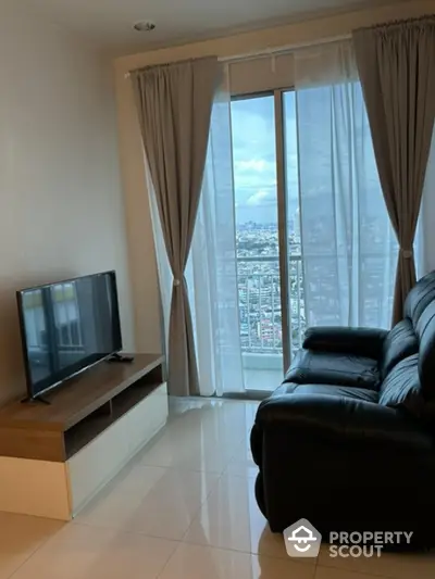 Modern living room with leather sofa and city view balcony