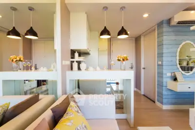 Modern living room with stylish decor and open kitchen layout