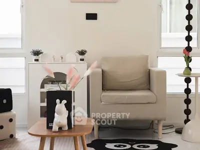 Chic modern living room with cozy armchair and stylish decor