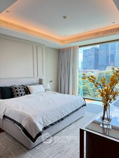 Luxurious bedroom with city view and elegant decor