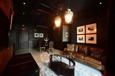 Luxurious industrial-style living room with leather sofa and modern lighting