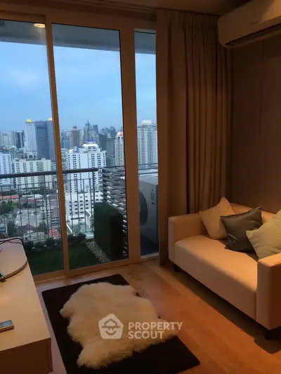 Chic urban living room with stunning city view from a high-rise balcony, featuring cozy seating and modern decor.