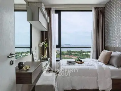 Luxurious bedroom with stunning ocean view and modern decor