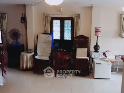 Cozy living room with vintage furniture and natural light