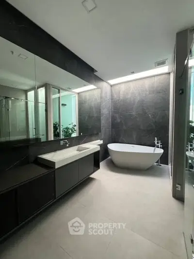 Luxurious modern bathroom with sleek design and freestanding bathtub
