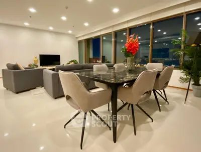 Luxurious open-plan living and dining area with panoramic city views