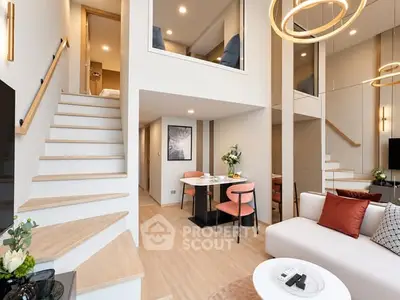 Modern duplex living room with stylish decor and open layout