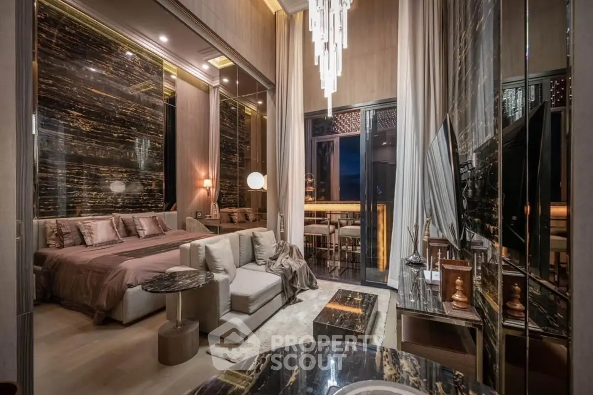 Luxurious modern bedroom with elegant decor and spacious balcony view