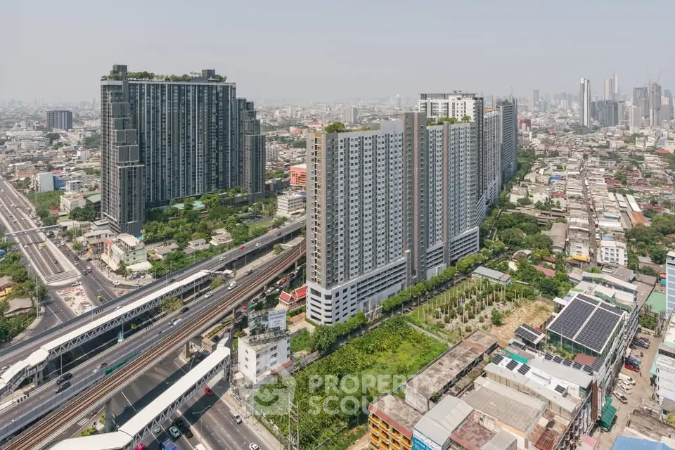 Stunning aerial view of modern high-rise buildings in a bustling urban landscape, showcasing prime real estate opportunities.