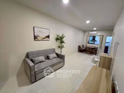 Modern living room with sleek furniture and minimalist decor