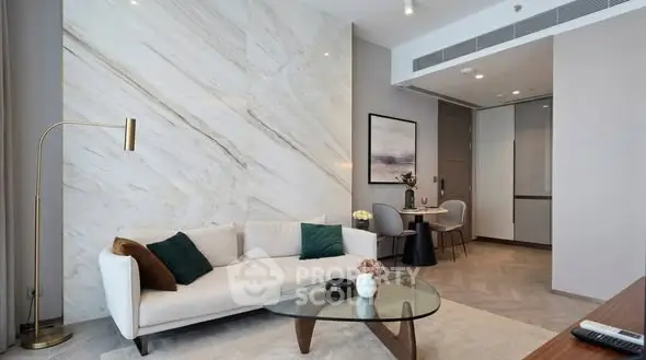 Luxurious modern living room with elegant marble accent wall and stylish furniture