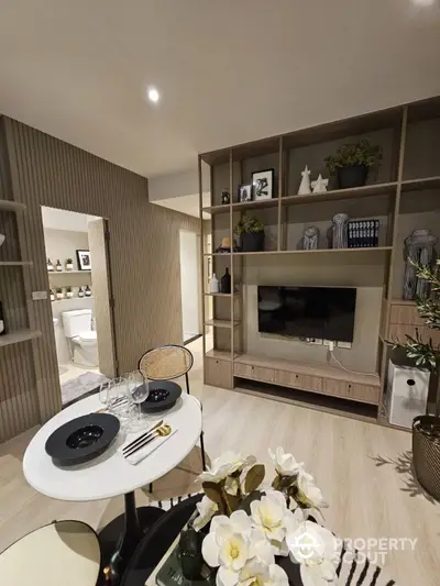 Modern living room with stylish decor and built-in shelving unit