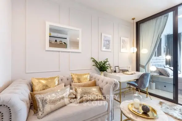 Luxurious living room with elegant decor and gold accents