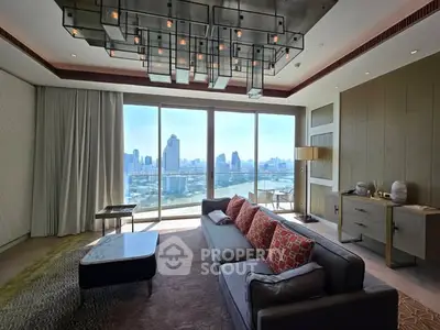 Luxurious living room with stunning city view and modern chandelier
