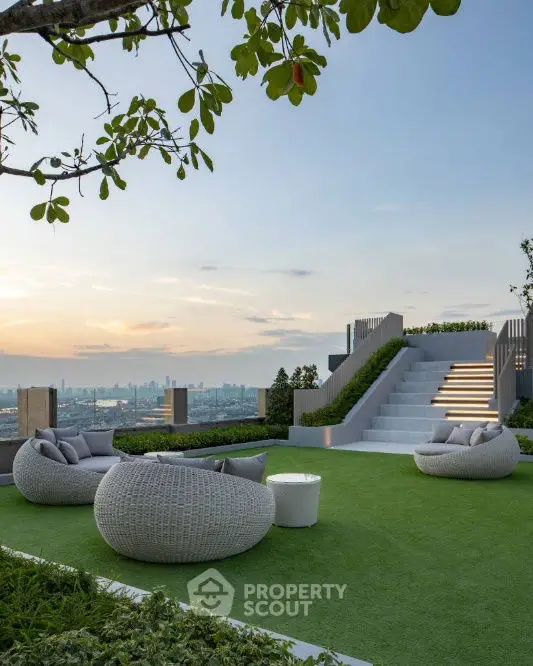 Luxurious rooftop garden with modern seating and stunning city view at sunset.