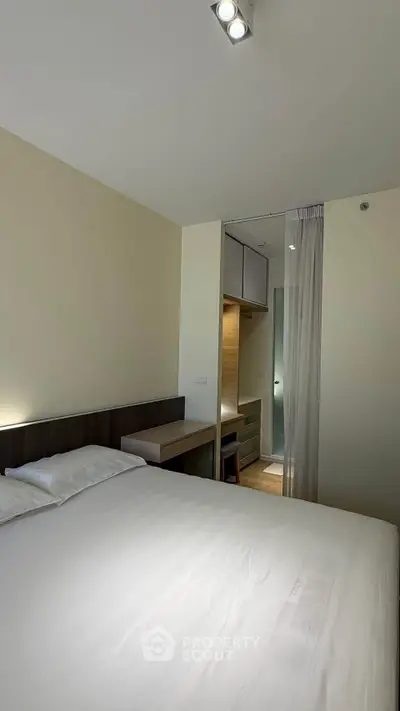 Modern bedroom with minimalist design and cozy ambiance