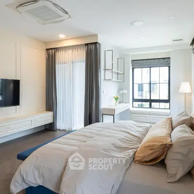 Luxurious modern bedroom with elegant decor and natural light