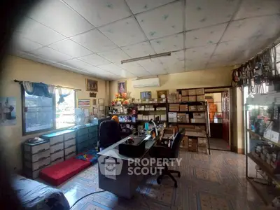 Spacious home office with ample storage and natural light