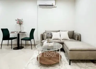 Stylish living room with modern furniture and elegant decor, perfect for cozy gatherings.