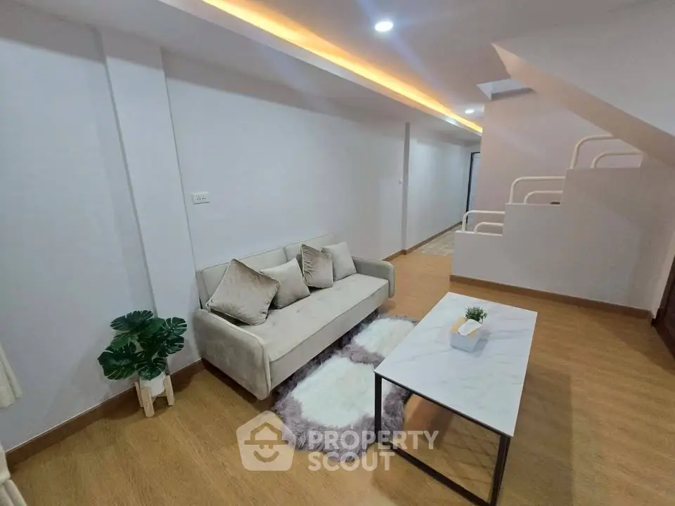 Modern living room with cozy sofa and stylish decor