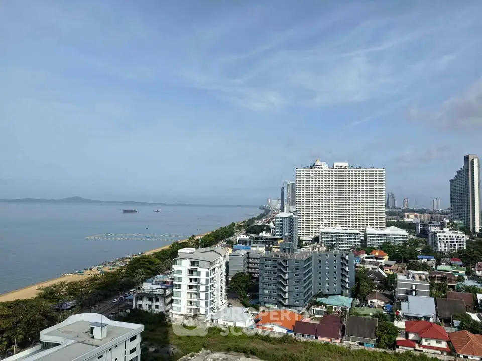 Stunning coastal cityscape view with high-rise buildings and ocean horizon, perfect for urban living.