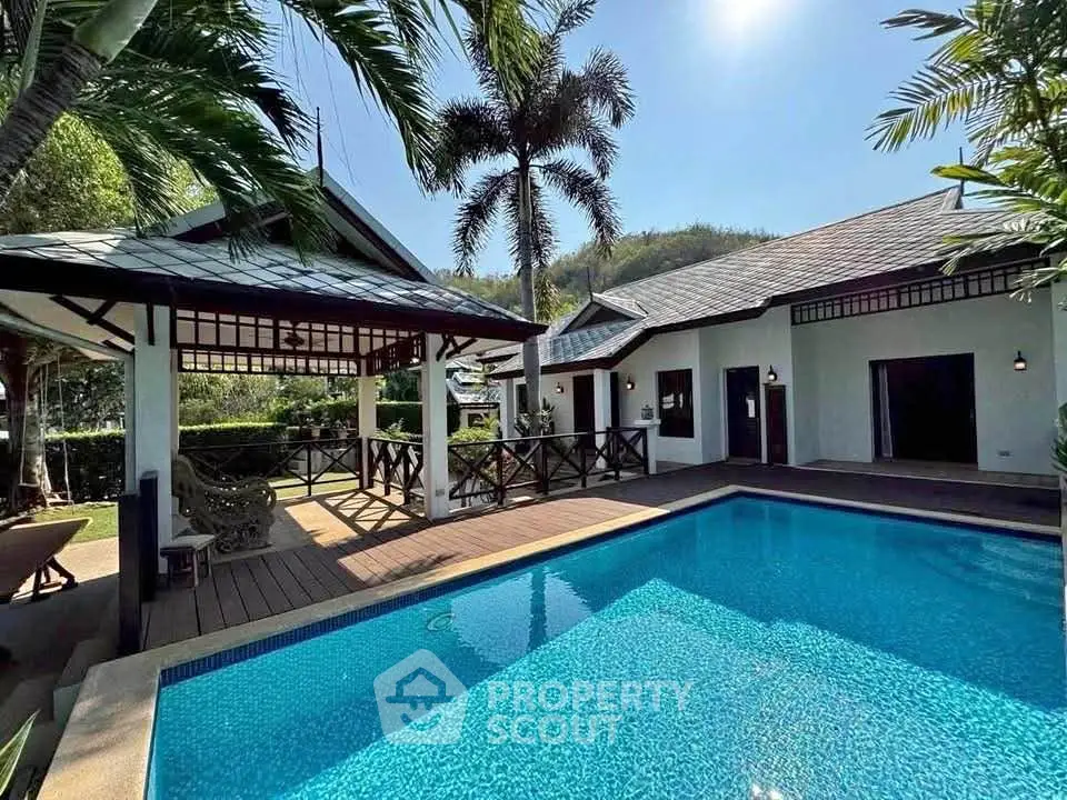 Luxurious villa with private pool and tropical garden, perfect for serene living.