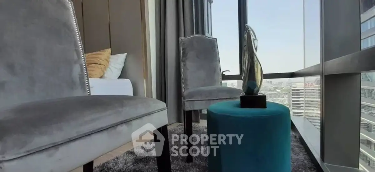 Luxurious high-rise apartment with stunning city view and elegant interior design.