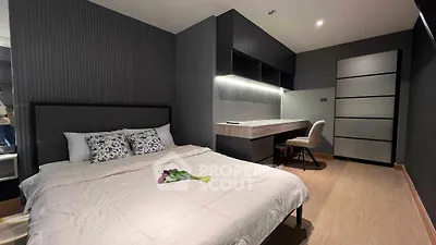 Modern bedroom with sleek design and cozy ambiance