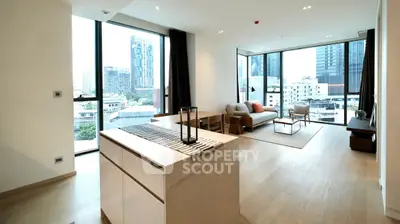 Spacious modern living room with panoramic city views and elegant decor