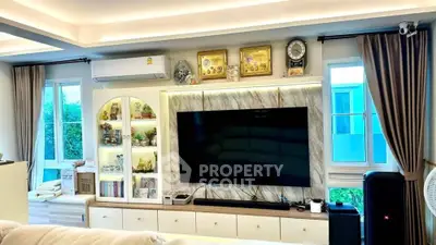 Modern living room with stylish TV setup and elegant decor
