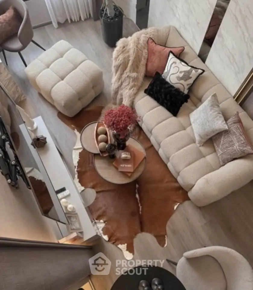 Stylish modern living room with plush seating and chic decor