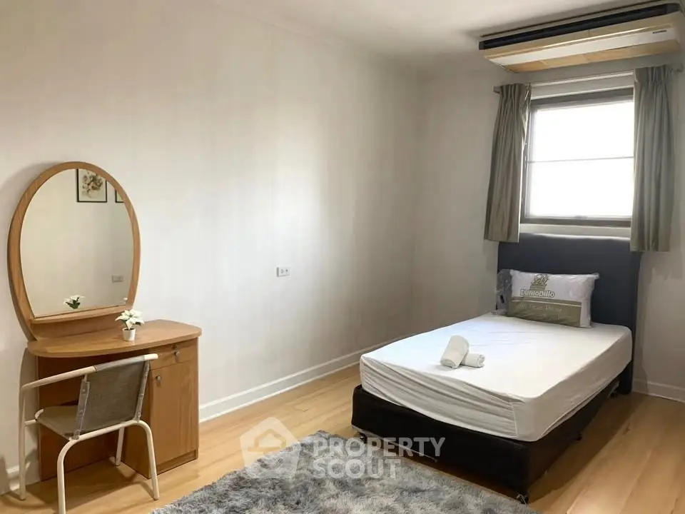 Cozy bedroom with minimalist decor and natural light
