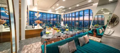 Luxurious modern living room with panoramic city views and elegant decor