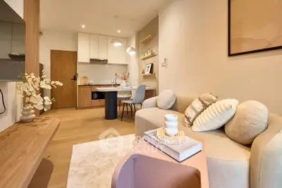 Modern open-plan living room with stylish decor and cozy seating area